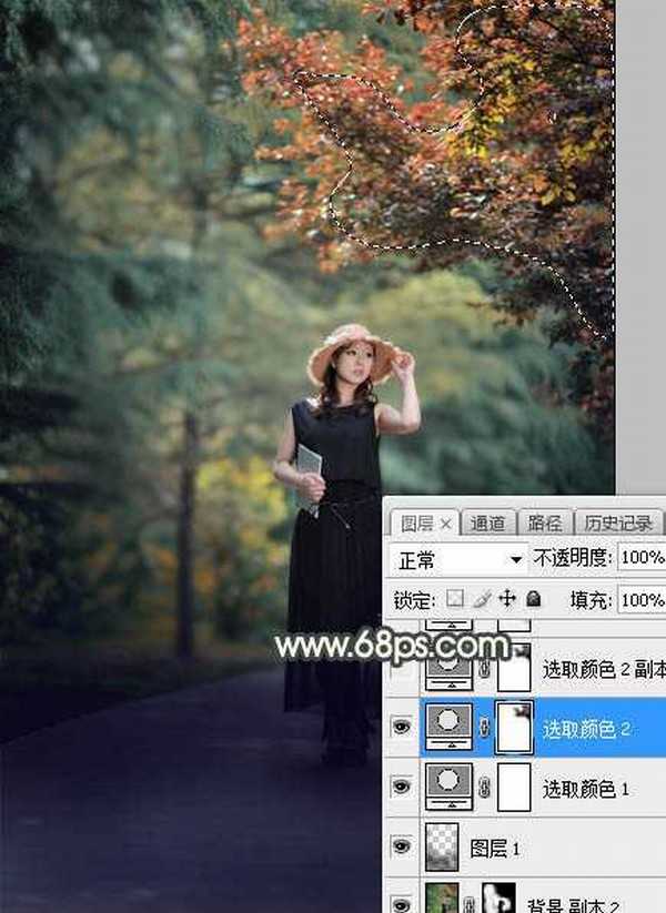 Photoshop将树林人物图片打造唯美的秋季暗调黄蓝色